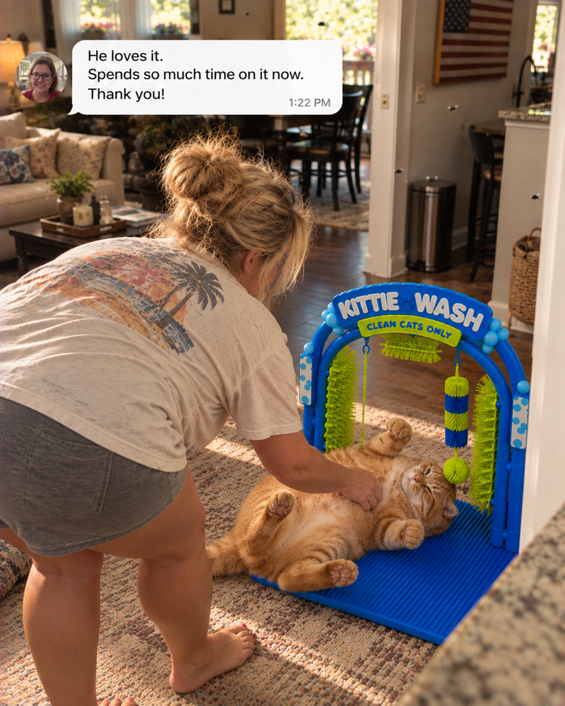 Customer photo review of cat using the self-grooming arch